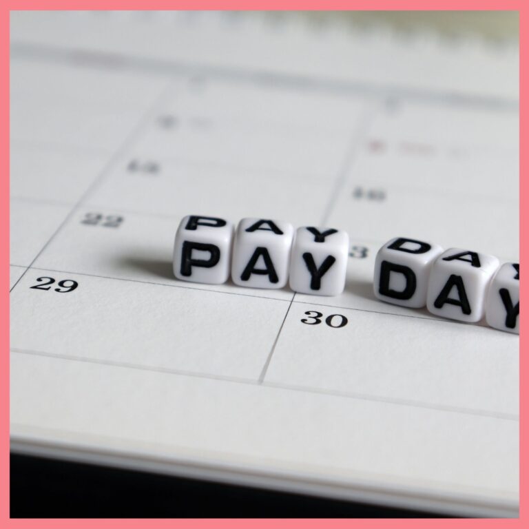 pay day pay check spelled out on calendar