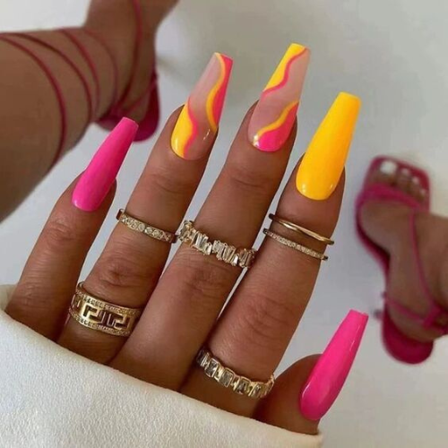 Tropical Vibes: Bright neon nails adorned with hot pink and yellow lemonade nail art designs.